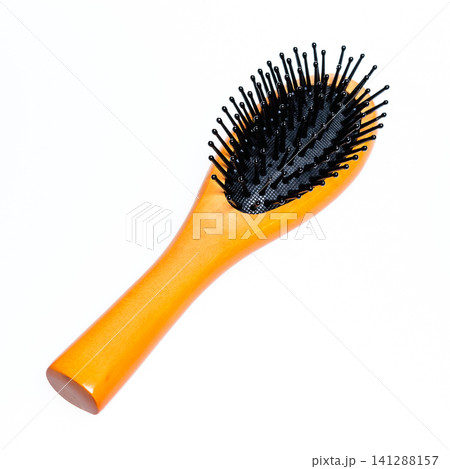a rubber floor brush comb isolated in white background a rubber floor brush comb isolated in white background 141288157