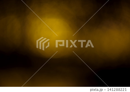 many of bokeh from light bulb tube on a street at night that look like luxury golden star light in dark background many of bokeh from light bulb tube on a street at night that look like luxury golden star light in dark background 141288221