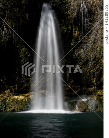 beautiful waterfall in the forest beautiful waterfall in the forest 141289555