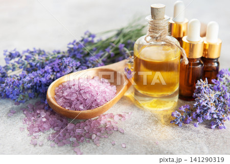 Lavender essential oil with bath salt for aromatherapy relaxation Lavender essential oil with bath salt for aromatherapy relaxation 141290319