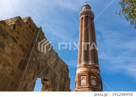 layers of history with roman architecture and a turkish minaret layers of history with roman architecture and a turkish minaret 141290450