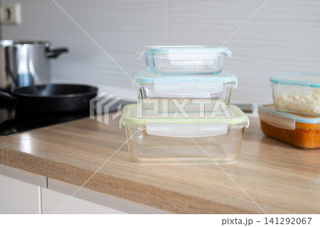 Stack of empty glass food storage containers Stack of empty glass food storage containers 141292067