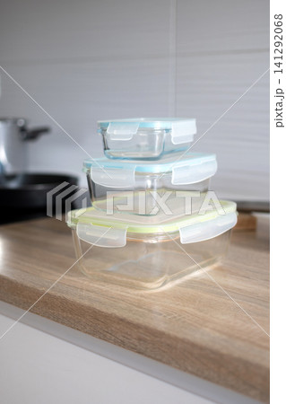 Stack of empty glass food storage containers Stack of empty glass food storage containers 141292068