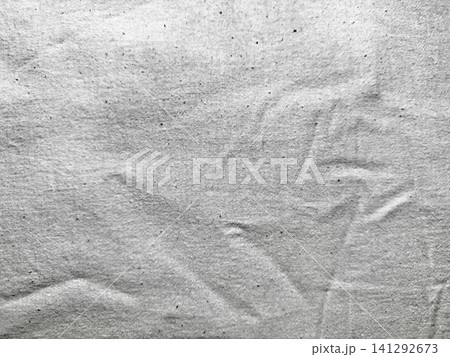 crinkled white organic cotton canvas texture background with subtle natural linen flecks and soft shadows crinkled white organic cotton canvas texture background with subtle natural linen flecks and soft shadows 141292673