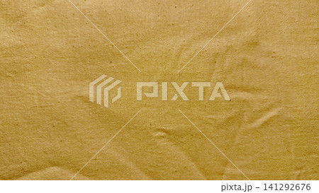 mustard yellow linen fabric texture background with natural organic crumpled weave pattern 141292676