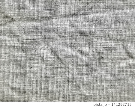 grey textured linen fabric background with subtle organic wrinkles in natural monochrome light for minimalist design grey textured linen fabric background with subtle organic wrinkles in natural monochrome light for minimalist design 141292713