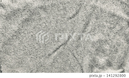 black denim fabric texture shows organic acid wash pattern in close up minimalist aesthetic for rustic apparel fashion design 141292800