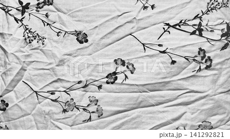 crumpled white linen fabric featuring delicate monochrome wildflower pattern offers organic minimalist texture for design crumpled white linen fabric featuring delicate monochrome wildflower pattern offers organic minimalist texture for design 141292821