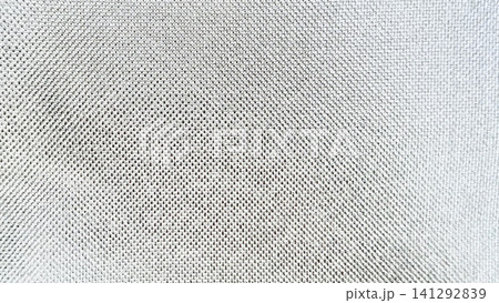minimalist white woven textile texture reveals organic linen mesh structure creating serene atmospheric backdrop minimalist white woven textile texture reveals organic linen mesh structure creating serene atmospheric backdrop 141292839