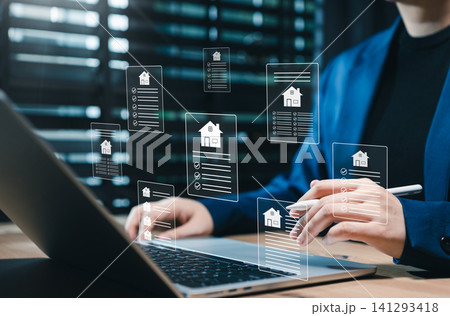 Real estate document management concept. Person reviewing property files, house contracts, checklist approval, online mortgage paperwork, property workflow, secure housing record, transaction review Real estate document management concept. Person reviewing property files, house contracts, checklist approval, online mortgage paperwork, property workflow, secure housing record, transaction review 141293418