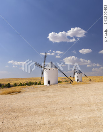 Traditional windmills standing in Campo de Criptana, La Mancha, Spain 141295492