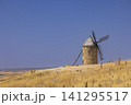 Historic windmill standing on dry hill Mota del Cuervo Historic windmill standing on dry hill Mota del Cuervo 141295517