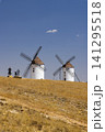 Don Quixote sculptures overlooking traditional windmills Mota del Cuervo Don Quixote sculptures overlooking traditional windmills Mota del Cuervo 141295518