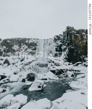 Oxarafoss waterfall in Thingvellir National Park, Iceland, during snowy winter. Oxarafoss waterfall in Thingvellir National Park, Iceland, during snowy winter. 141297799