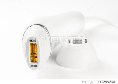 Modern IPL photoepilator and attachment precision isolated on white background, beauty device Modern IPL photoepilator and attachment precision isolated on white background, beauty device 141299238