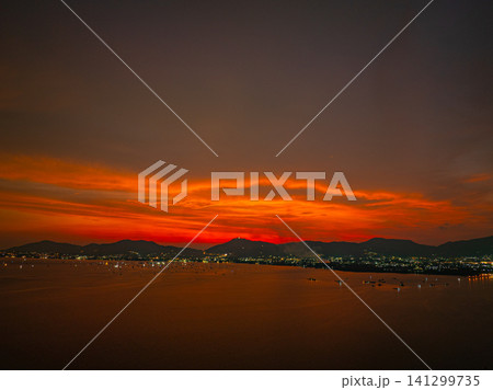 Vibrant Sunset Sky Above the Andaman Sea in Phuket Vibrant Sunset Sky Above the Andaman Sea in Phuket 141299735