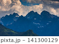 Sunlit green mountain valley with meadow, forested slopes in Zakopane Tatras mountains 141300129