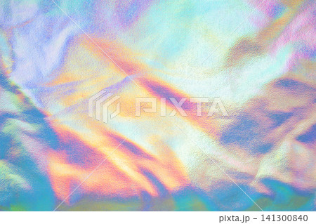 Holographic iridescent pastel texture background with shimmering metallic foil and crumpled effect Holographic iridescent pastel texture background with shimmering metallic foil and crumpled effect 141300840