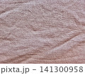 dusty rose pink woven fabric texture close up showing coarse linen weave for minimalist graphic design background 141300958