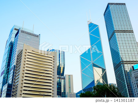 Contemporary metropolitan architectural style. Glass building in of Hong Kong financial district Contemporary metropolitan architectural style. Glass building in of Hong Kong financial district 141301187