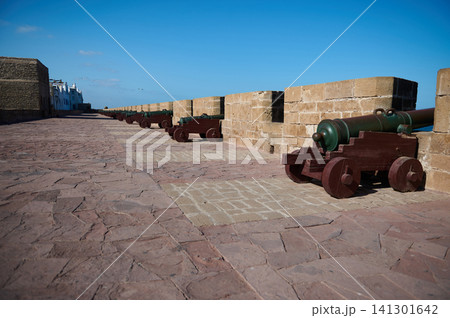 Row of historic cannons on the Skala sea wall in Essaouira, Morocco medina promenade 141301642