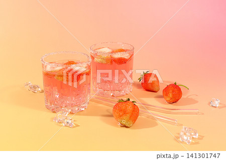 Modern still life with strawberry pink martini, layout, alcoholic cocktail with strawberries on an elegant modern background with long shadows, minimalist concept for bar and holiday party, cafe, Modern still life with strawberry pink martini, layout, alcoholic cocktail with strawberries on an elegant modern background with long shadows, minimalist concept for bar and holiday party, cafe, 141301747