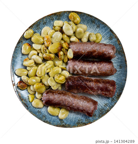 Hot delicious sausages with beans and parsley on plate Hot delicious sausages with beans and parsley on plate 141304289
