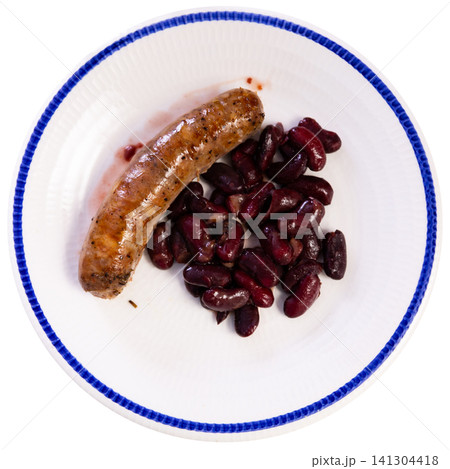 Fried sausages served with beans on plate 141304418
