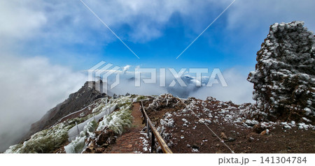 Cloudy and frosty weather at the highest point of La Palma island, Roque de los Muchachos, with minimal visibility due to weather conditions. High quality photo 141304784