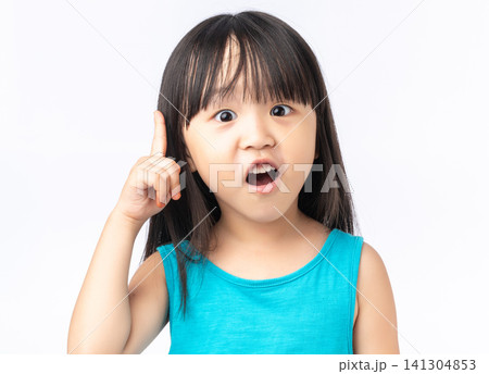 Happy Asian girl pointing finger up having a great idea, eureka moment or discovery concept. 141304853