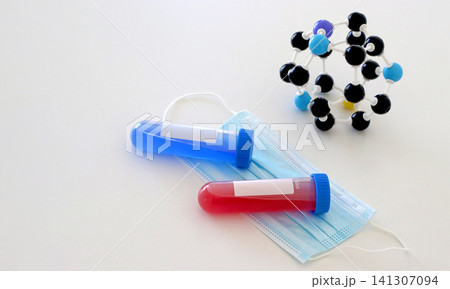 Medical composition with laboratory sample tubes, face mask and molecular model for virus research and infectious disease diagnostics. Healthcare concept for pathogen analysis and scientific studies. Medical composition with laboratory sample tubes, face mask and molecular model for virus research and infectious disease diagnostics. Healthcare concept for pathogen analysis and scientific studies. 141307094