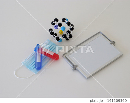 Medical laboratory composition with molecular structure, sample tubes and blank information board for virus diagnostics, chemistry education and healthcare research concepts. 141309560