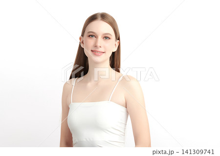 A beautiful young Asian woman with clean, fresh skin against a white background. Skincare, facial treatment, cosmetology, beauty, and spa. An elegant portrait of an Asian woman. A beautiful young Asian woman with clean, fresh skin against a white background. Skincare, facial treatment, cosmetology, beauty, and spa. An elegant portrait of an Asian woman. 141309741