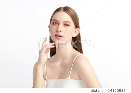 A beautiful young Asian woman with clean, fresh skin against a white background. Skincare, facial treatment, cosmetology, beauty, and spa. An elegant portrait of an Asian woman. A beautiful young Asian woman with clean, fresh skin against a white background. Skincare, facial treatment, cosmetology, beauty, and spa. An elegant portrait of an Asian woman. 141309834