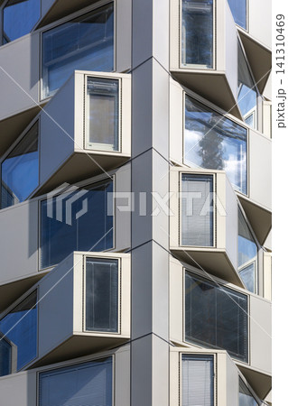 The facade of a modern multi-storey building in the Seestadt residential complex in Vienna The facade of a modern multi-storey building in the Seestadt residential complex in Vienna 141310469