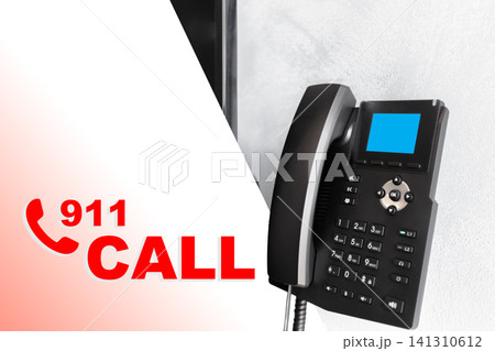 Emergency service phone for 911 calls located in a public area, ready for use at any time of day Emergency service phone for 911 calls located in a public area, ready for use at any time of day 141310612