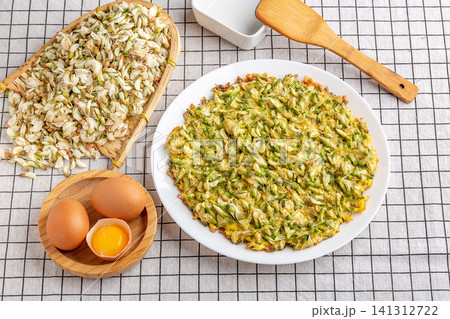 homemade acacia flower egg pancake with fresh ingredients preparation view. homemade acacia flower egg pancake with fresh ingredients preparation view. 141312722