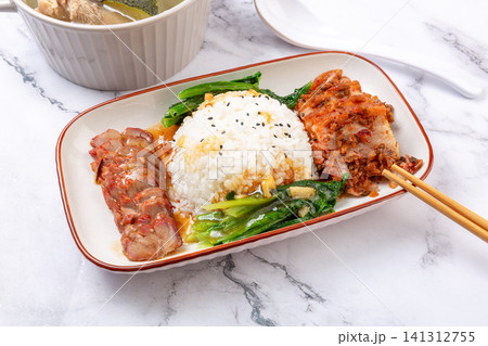 traditional Chinese combo rice with braised pork belly and sweet BBQ pork char siu. traditional Chinese combo rice with braised pork belly and sweet BBQ pork char siu. 141312755