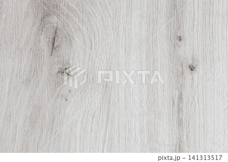 Horizontal close up overhead view of a light grey wood texture with a natural oak pattern and rustic timber board knots for minimalist interior design Horizontal close up overhead view of a light grey wood texture with a natural oak pattern and rustic timber board knots for minimalist interior design 141313517