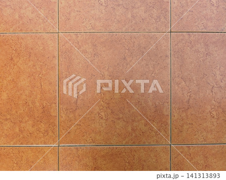 Brown terracotta ceramic floor tiles texture background, top view. Brown terracotta ceramic floor tiles texture background, top view. 141313893