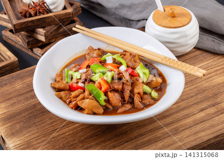 braised pork intestines with bell peppers in rich brown savory sauce braised pork intestines with bell peppers in rich brown savory sauce 141315068