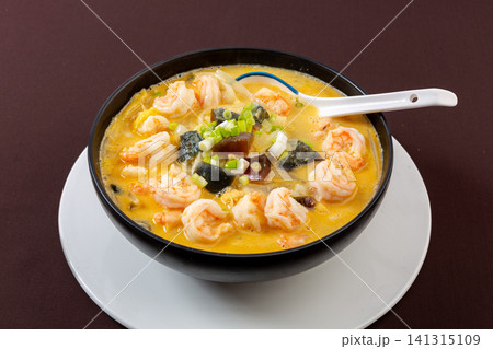tender baby cabbage simmered in rich golden broth with prawns and century egg 141315109