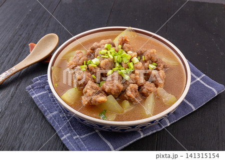 braised winter melon with minced donkey meatballs, traditional Northern Chinese dish braised winter melon with minced donkey meatballs, traditional Northern Chinese dish 141315154