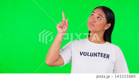 Pointing, volunteer and Asian woman on green screen for charity announcement, news and information. NGO, mockup and person with hand gesture for non profit, community service and help in studio Pointing, volunteer and Asian woman on green screen for charity announcement, news and information. NGO, mockup and person with hand gesture for non profit, community service and help in studio 141315860