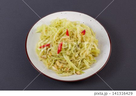 chilled Shredded Celtuce Salad Dressed with Rich Sesame Peanut Sauce and Chilies chilled Shredded Celtuce Salad Dressed with Rich Sesame Peanut Sauce and Chilies 141316429