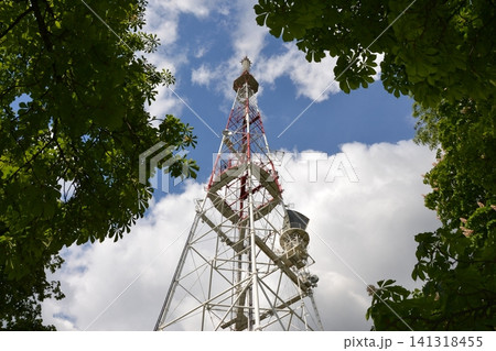 Weather station on blue sky and trees background.  141318455