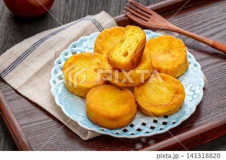 pan fried coarse grain corn cakes with golden crispy crust pan fried coarse grain corn cakes with golden crispy crust 141318820