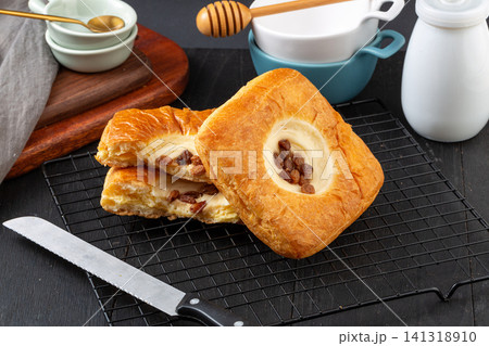 sweet raisin cream danish pastry flaky puff bread with custard filling sweet raisin cream danish pastry flaky puff bread with custard filling 141318910