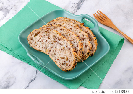 slices of artisanal European sourdough bread with flaxseed and walnut slices of artisanal European sourdough bread with flaxseed and walnut 141318988