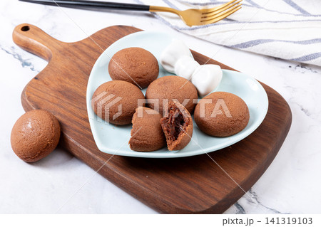 soft baked chocolate cookies with gooey lava chocolate filling soft baked chocolate cookies with gooey lava chocolate filling 141319103